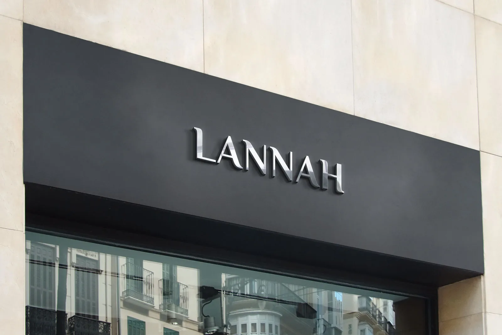 Lannah wordmark in silver letters on a dark storefront sign.