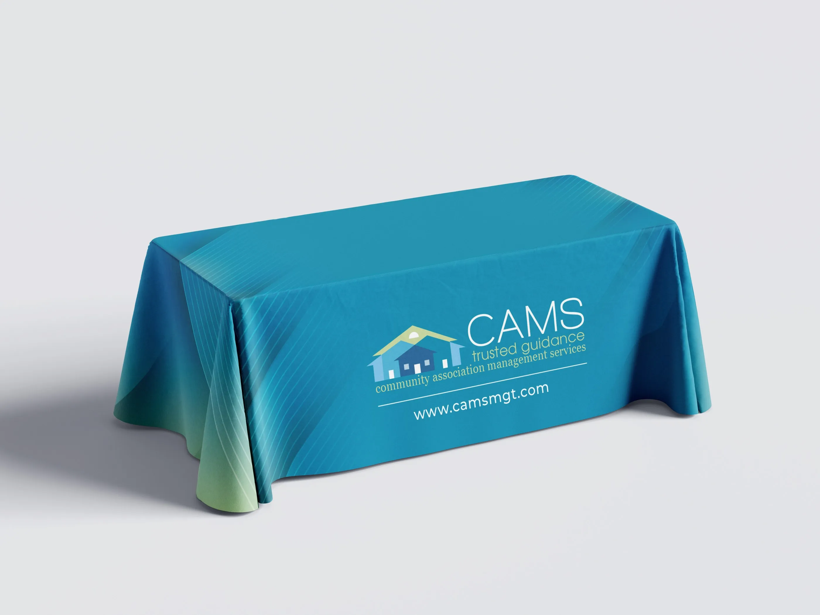 CAMS table cover in deep blue with the CAMS logo, trusted guidance line and website.