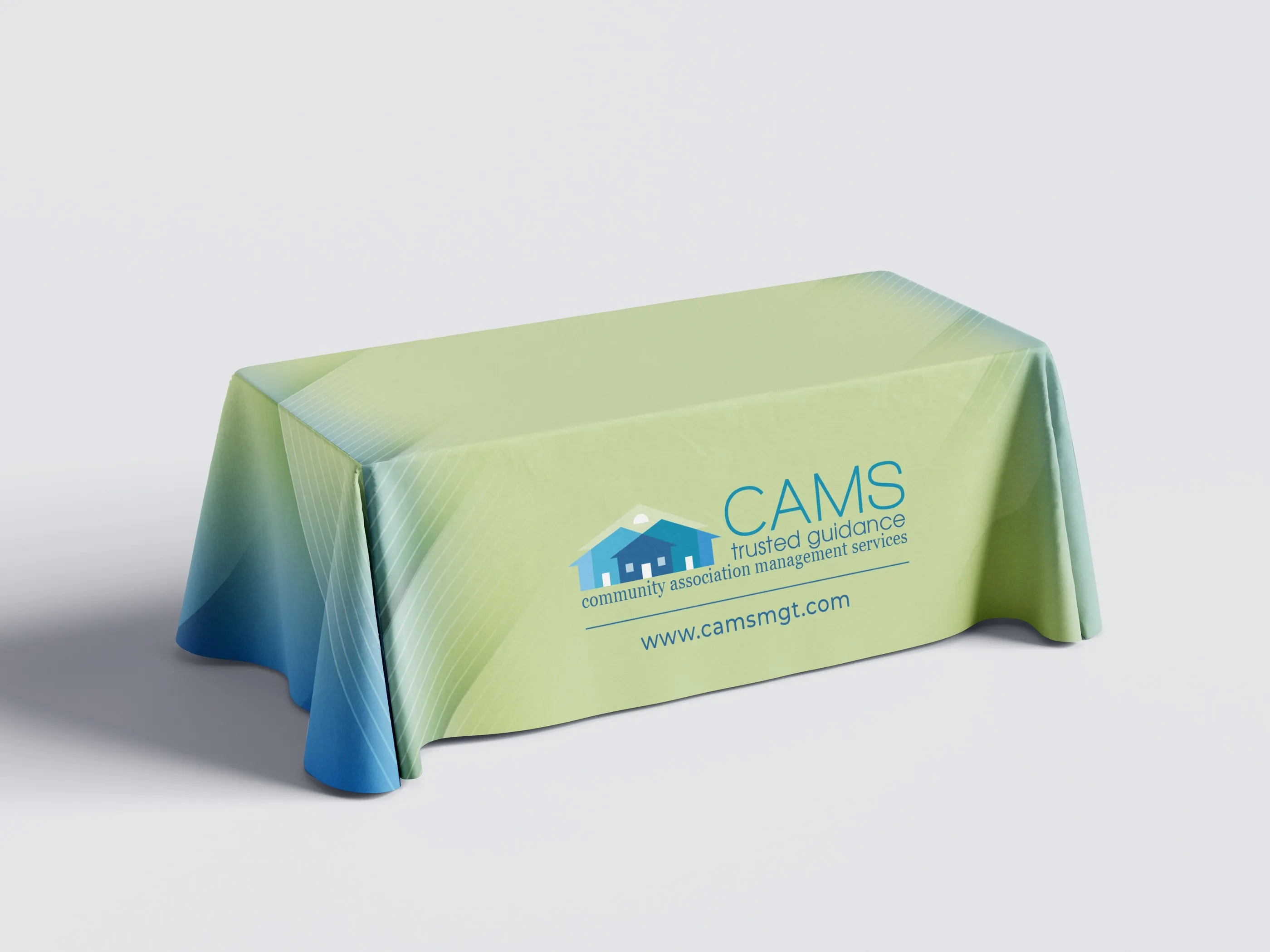 CAMS table cover in a green-to-blue gradient with the CAMS logo and website.