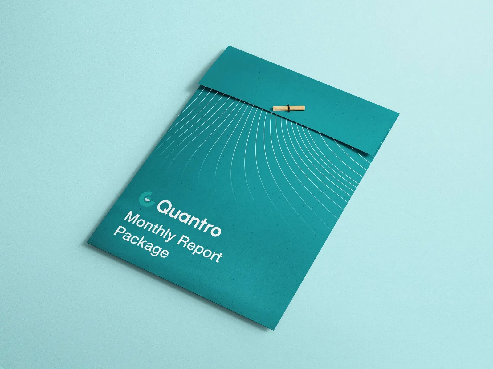 Teal Quantro envelope for a "Monthly Report Package" on a pale aqua background.
