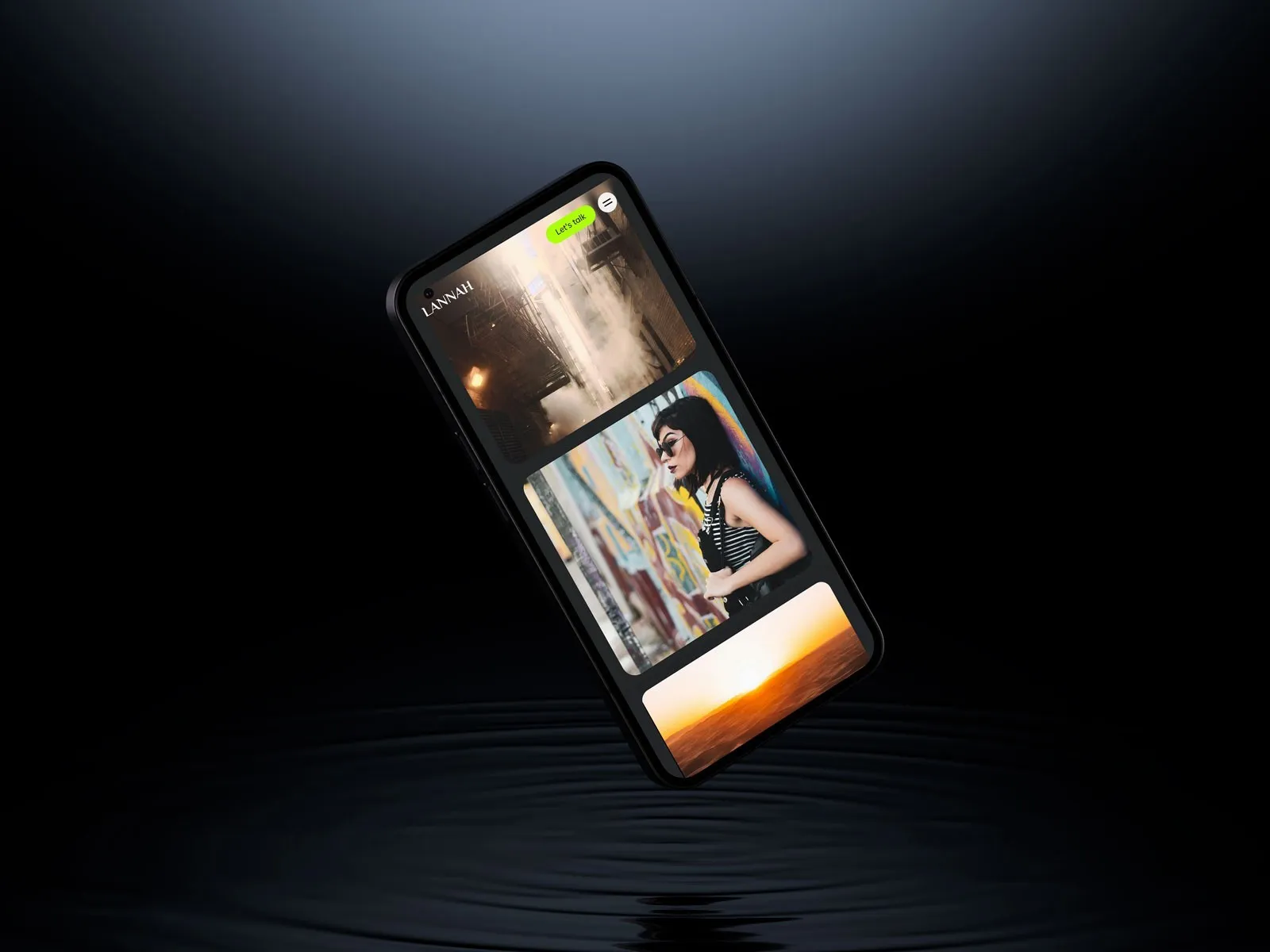 Phone floating over dark water showing the Lannah mobile site with a street-art portrait.