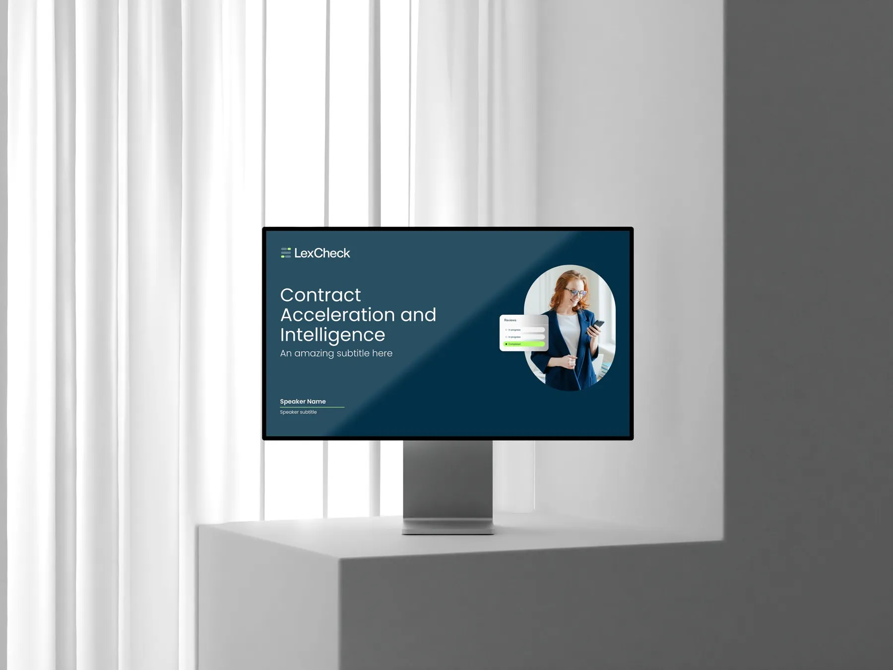 LexCheck title slide, "Contract Acceleration and Intelligence", shown on a desktop monitor in a white room.