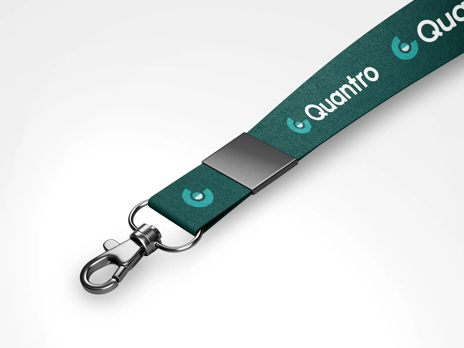 Dark green Quantro lanyard with a metal clip.