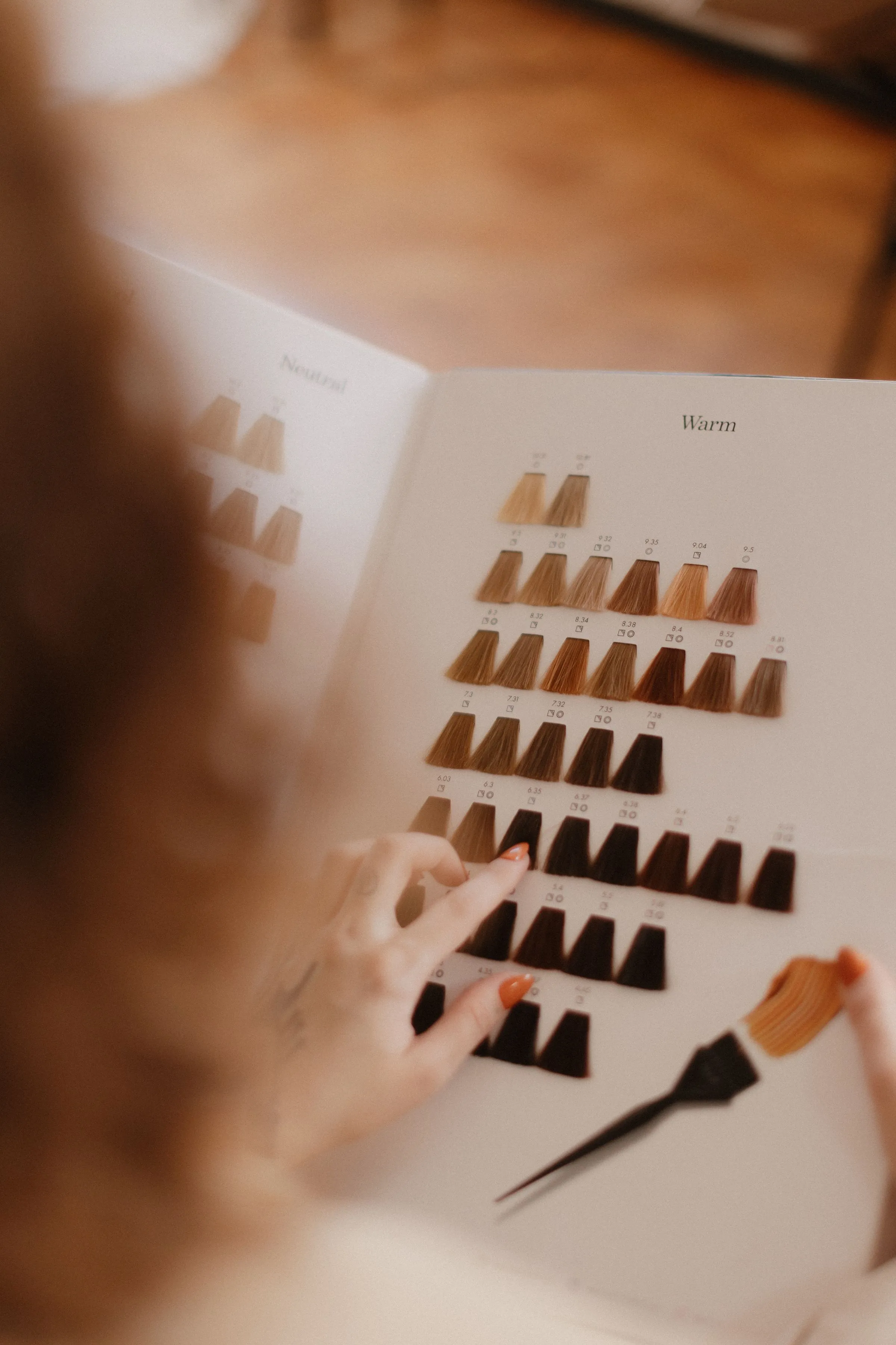 Choosing a shade from the color swatch book.