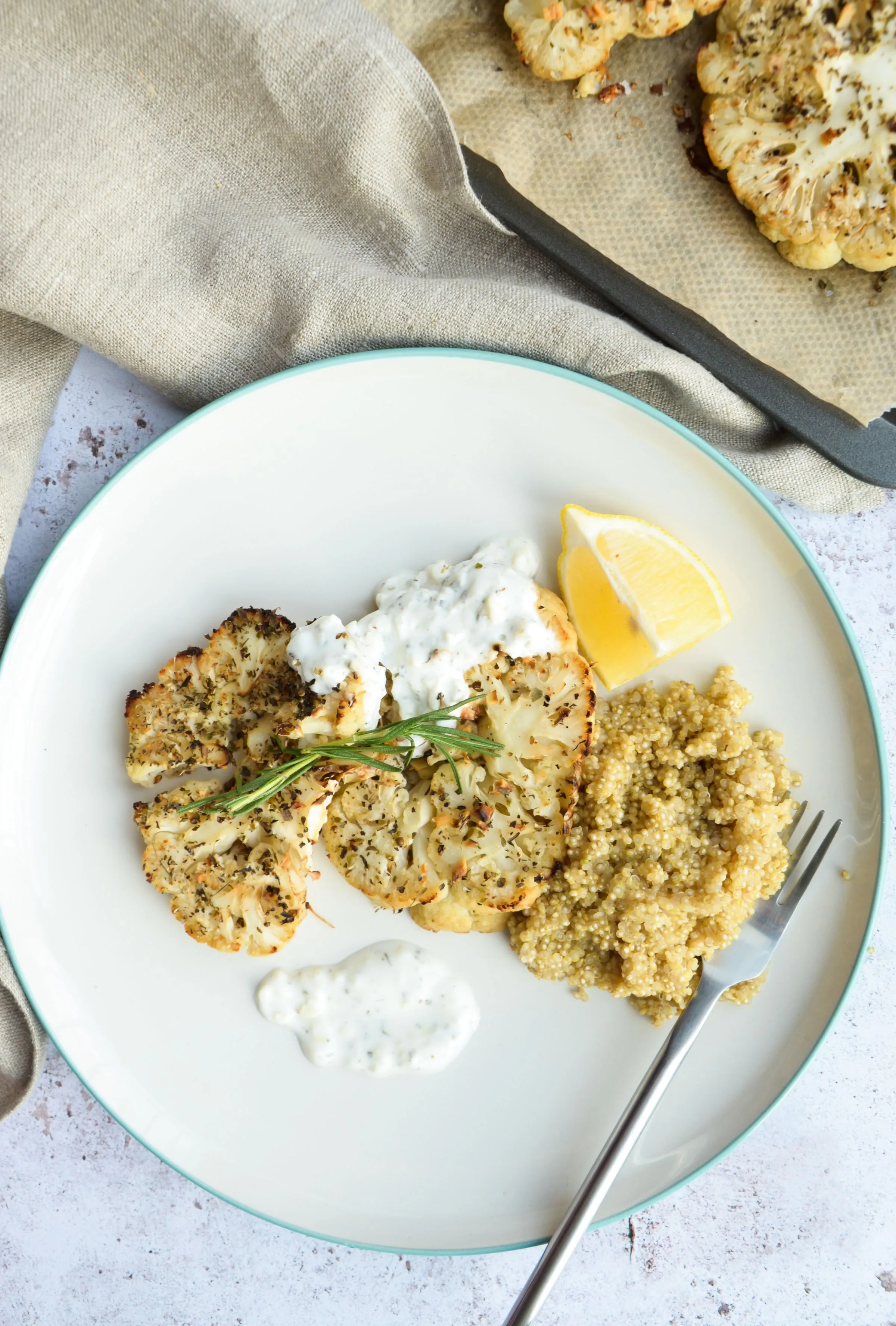 Fire-roasted cauliflower with yogurt, herbs and lemon.