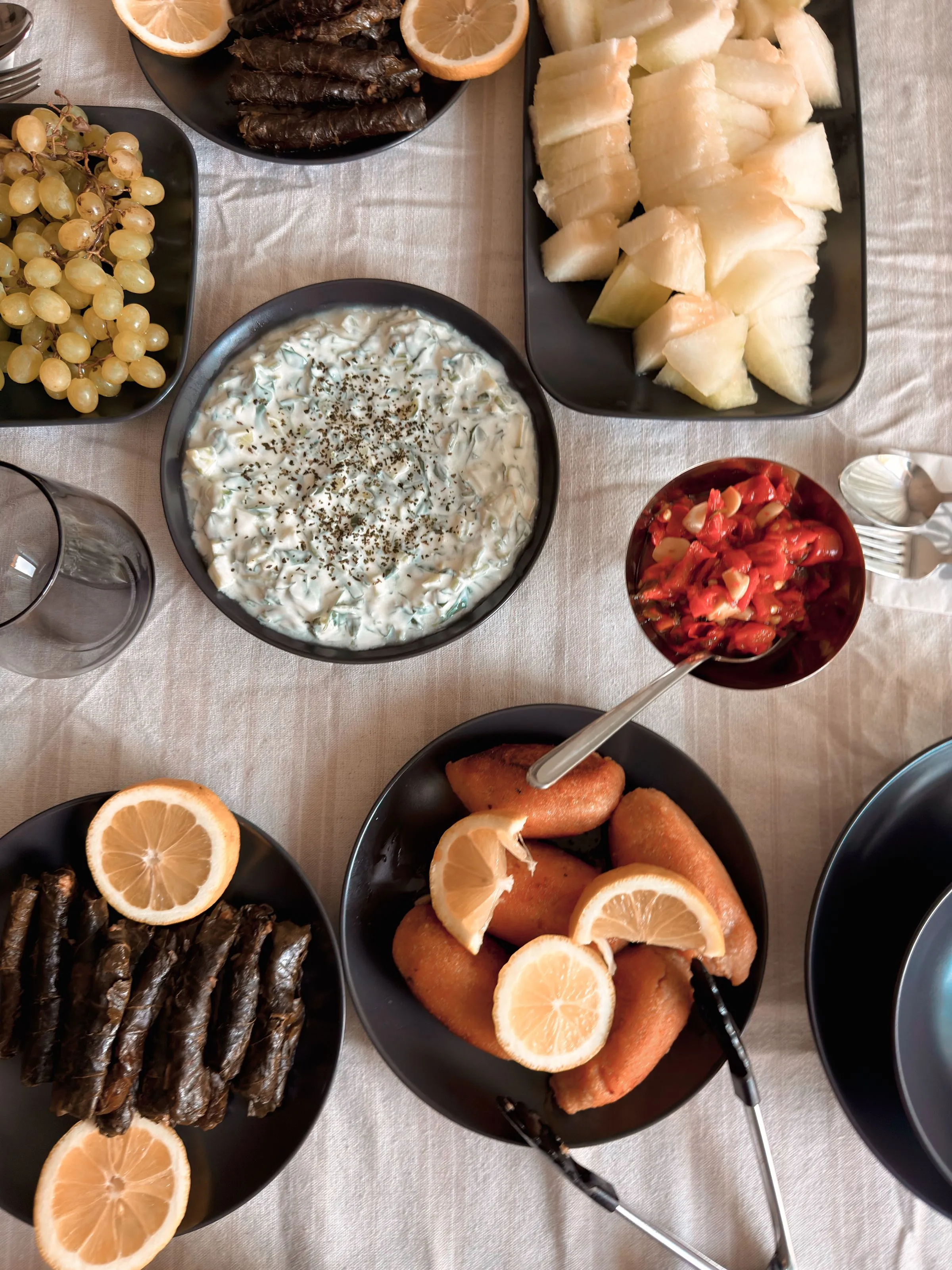 Cheese, olives, stuffed vegetables and citrus.