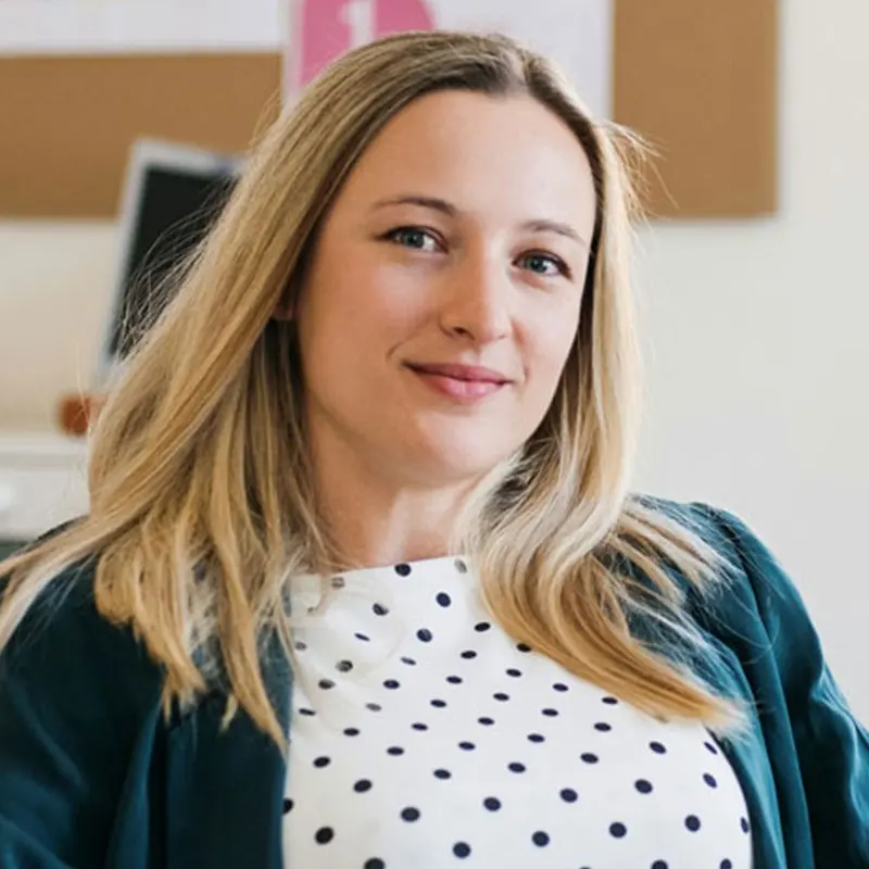 Portrait of Sarah Collins in the Quantro office